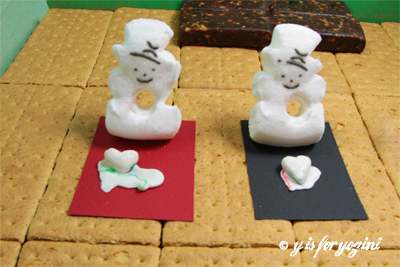 marshmallow snowmen melting their hearts on yoga mats
